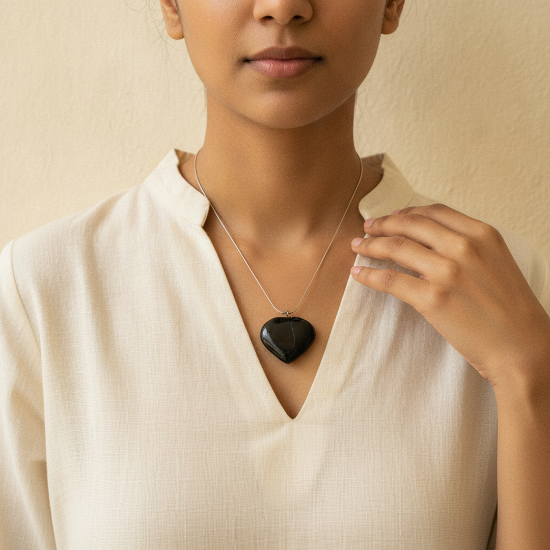 Black Tourmaline Heart Pendant — worn moment
