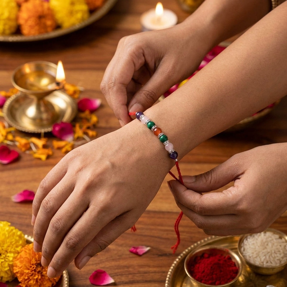 Navratna Rakhi worn on wrist