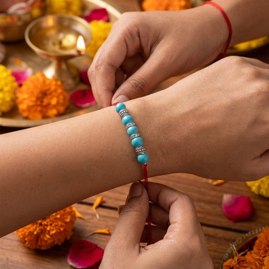 Firoza Rakhi worn on wrist